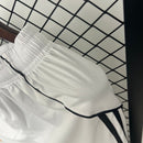 M U 25/26 Primera Equipación Pantalón Corto - Bota de Oro Tienda